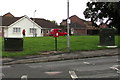 Postman near a postbox, Llangennech