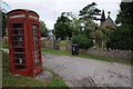 Telephone box outside Besford church