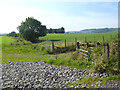 Ditch and gate near Milngate