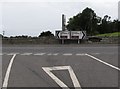 Direction signs on the A2 at the junction with Tullyframe Road