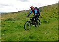 NS9599 : Walking the mountain bike by Rude Health 