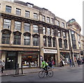 Cycling past Boswell & Co in Oxford