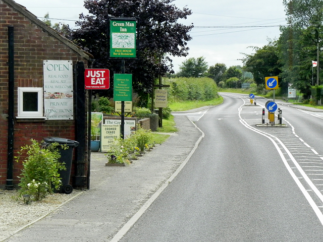 A148, Holt Road, Passing the Green Man at Little Snoring
