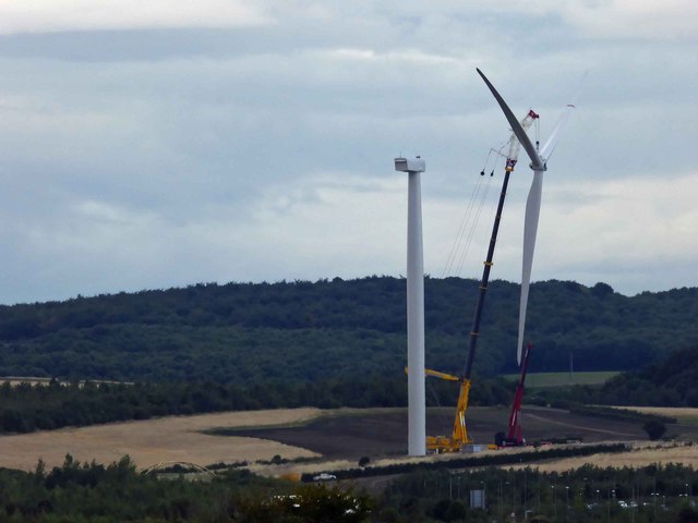 In failing light the wind turbine blades are installed #3
