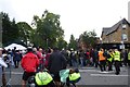 Parade turning onto Harehills Avenue