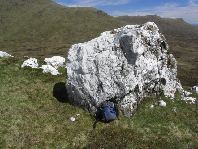 Large quartz boulder above Lairig Riarein, lower eastern slopes of Beinn nan Imirean
