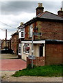 Public footpath sign and private lane notice on a Havenstreet corner