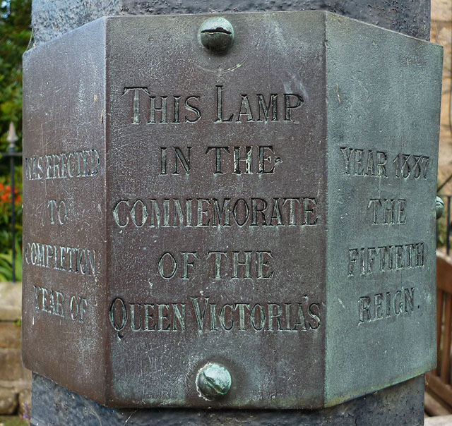 Plaque on the 'Cherub' lamp, Wray