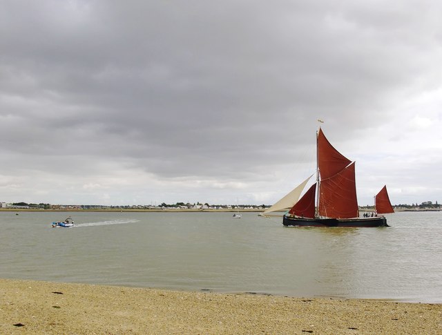 Sailing barge and Brightlingsea ferry at Mersea Stone