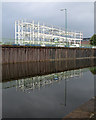 SK5738 : Steelwork reflected in the Nottingham Canal by John Sutton