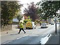 Laying traffic data collection cables on Main Street, Billinge