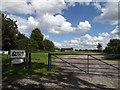 TM1360 : Footpath & entrance to Mickfield Business Park Car Park by Geographer