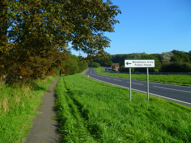 Looking eastwards across the A27 from footpath junction