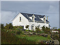 V8940 : The Cottage at Gallan Mor by Oliver Dixon