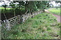 NY7219 : Gateway and dry stone wall beside farm track at Stoneriggs by Roger Templeman