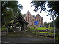 Lychgate and churchyard, All Saints