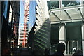 View of stripes from 60 Threadneedle Street reflected onto a sculpture of a feather #3