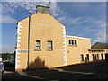 Building in shadow, Ederney