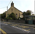 Talywain bus stop and shelter near a decaying former church