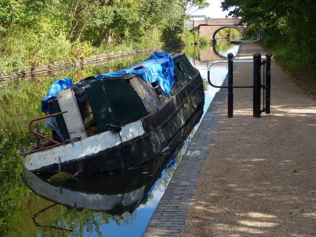 Burnt out narrowboat on the Birmingham & Fazeley Canal