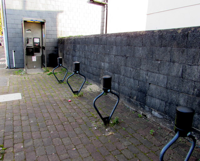 Bicycle racks and grey phonebox, Abersychan