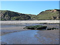 NZ4442 : Beach, rocks and cliffs by Warren House Gill (2) by Mike Quinn