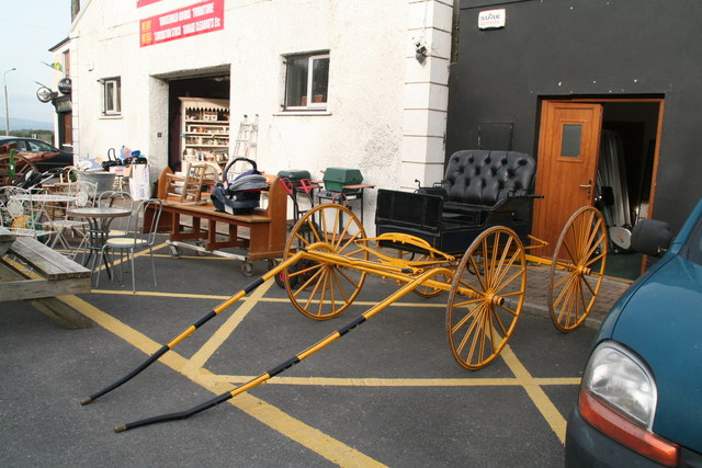 New and used furniture and a carriage for sale by the N22 at Farranfore