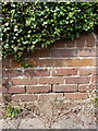 OS benchmark - Madeley, wall on Station Road