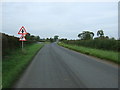 NY4243 : Minor road towards Carlisle approaching crossroads by JThomas