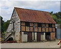 Timber-framed outbuilding at Bailing Hill Farm - with antler trophies