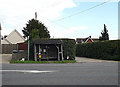 TM1159 : Bus Shelter on the A140 Pains Hill by Geographer