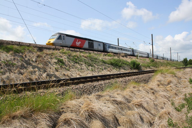 Virgin-branded East Coast train heads south from Northallerton Station