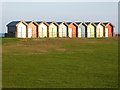 NZ3279 : Colourful beach huts at Blyth South Beach by Oliver Dixon
