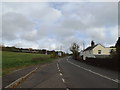 TM3861 : Layby on the B1121 Main Road, Benhall by Geographer