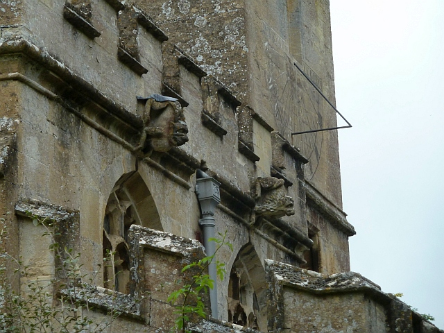 Gargoyles and sundial on the church of St James the Great, Bratton