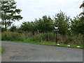 Signpost to West Newton farm