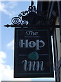 Sign for the Hop Inn, Openwoodgate