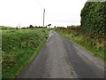 J3643 : View north-west along Dunturk Road from near the old barn by Eric Jones
