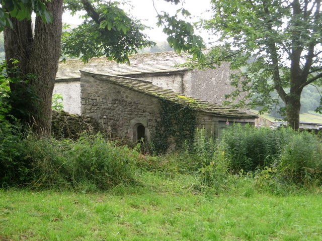 Stone building in corner of Kettlewell churchyard