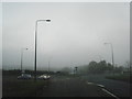 NZ4342 : A1086 roundabout in the gloom, north of Horden by Colin Pyle