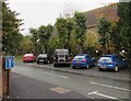 Cars parked on the Poyner Road pavement, Ludlow