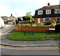 Two benches on a grassy Blaenavon corner