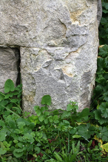Weathered benchmark on buttress of Christ Church