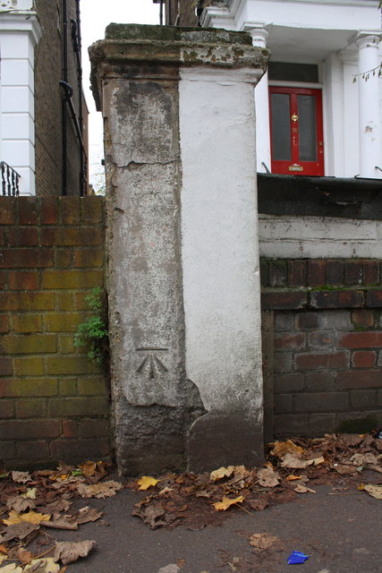 Benchmark on party wall pier of Nos. 28,30 Windsor Road