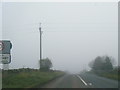 A686 in the gloom at Lagwathby village boundary