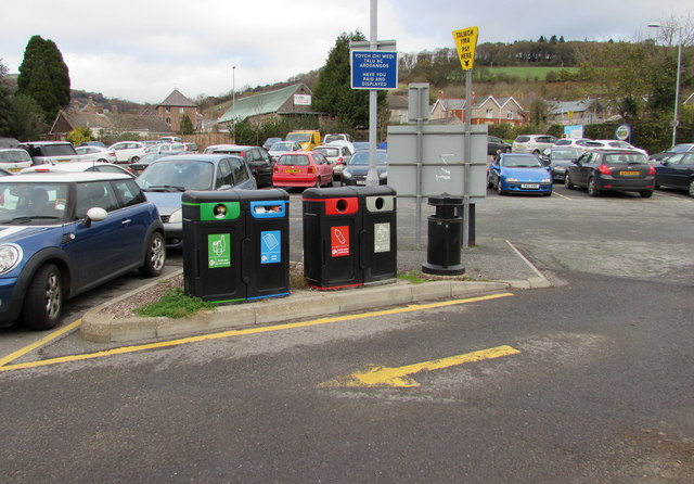 Four recycling bins in Crickhowell public car park