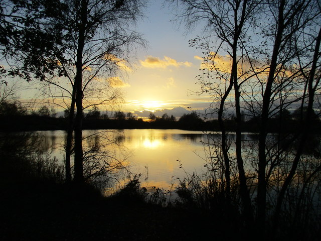 Sunset over a fishing pond