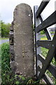 Benchmark on gatepost at field entrance from Church Street