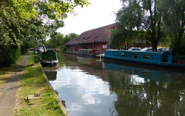 Narrowboats moored along the Grand Union Canal