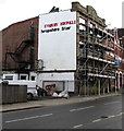 Missing letters on the side of former newspaper offices in Shrewsbury